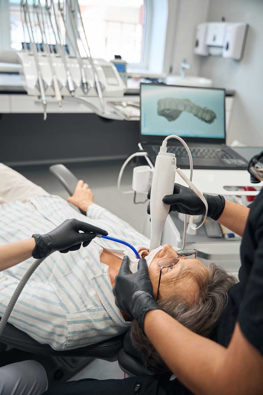 doctor-treats-an-elderly-ladys-teeth-2024-09-06-20-02-25-utc
