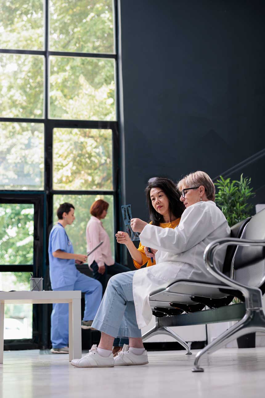 general-practitioner-and-asian-patient-analyzing