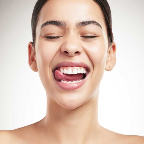 young-joyful-mixed-race-woman-sticking-out-her-ton-2024-09-28-03-10-08-utc